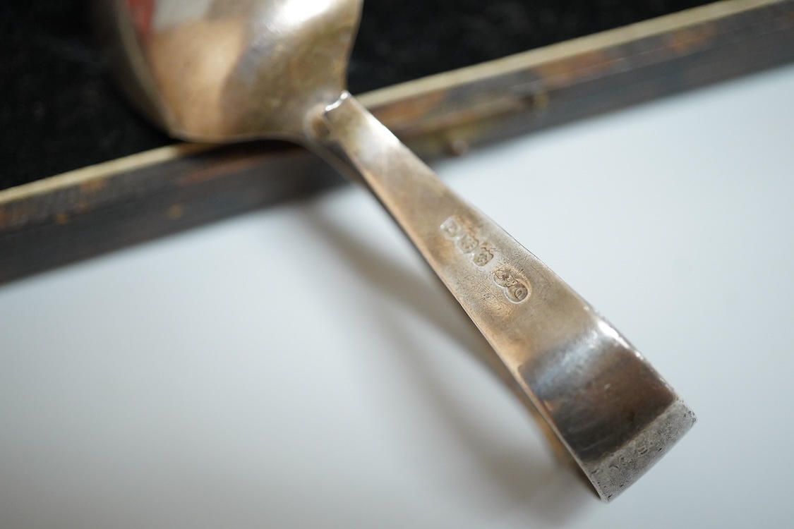 A cased pair of late Victorian silver shell salts on ball feet, with matching spoons, H. Bros, Birmingham, 1895, 46mm, together with a cased George V silver spoons and pusher and a Victorian silver shoe buckle (a.f.)